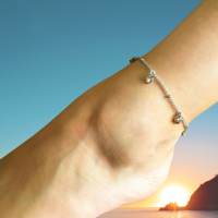 Zilveren Kinder enkelbandje met hartjes  7 jaar