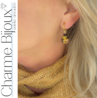 Klem oorbellen epoxy goud met zwart druppel