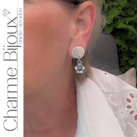 Clip oorbellen Turquoise bloem zilverkleur