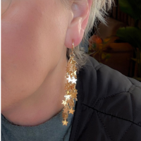 Klem oorbellen sterren goudkleurig 9 cm