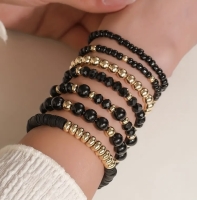 Armbanden set Zwart goudkleur 7- delig Armbanden set Zwart goudkleur 7- delig